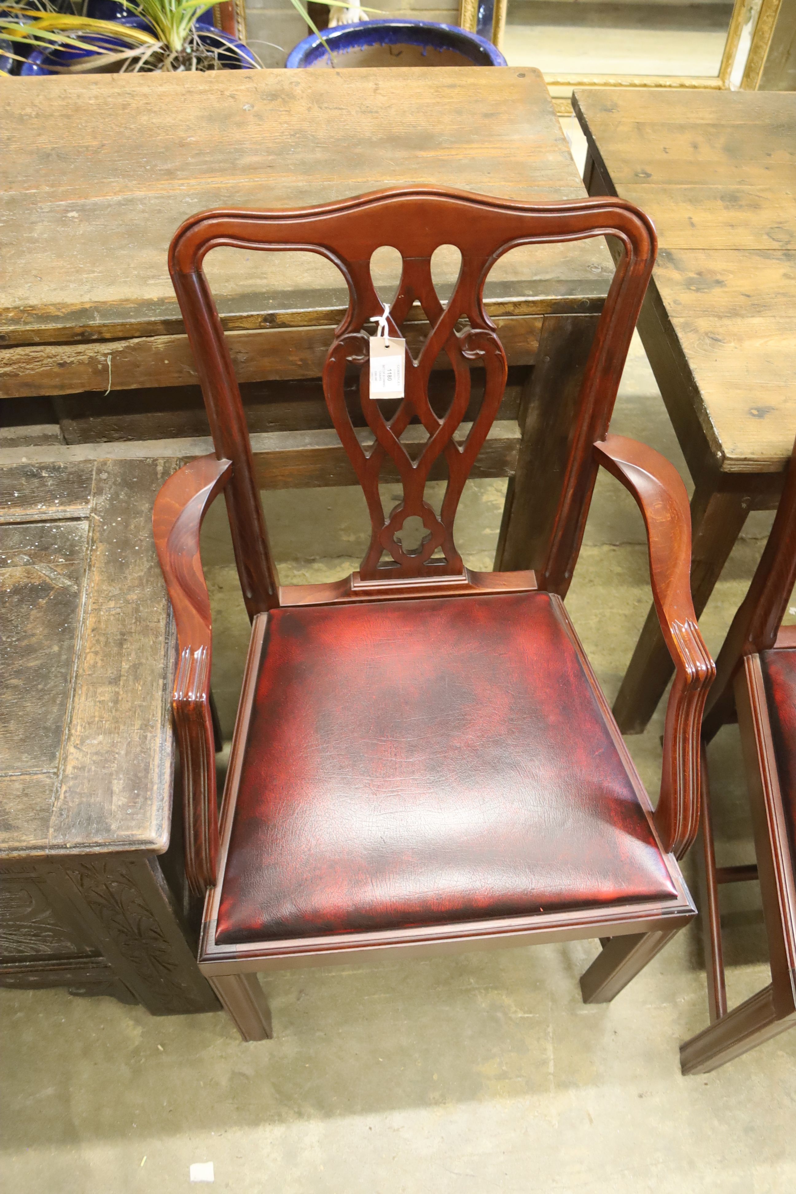A set of eight Chippendale style mahogany dining chairs (2 arm, 6 single)